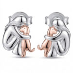 Srebrne kolczyki dziewczynka z pieskiem